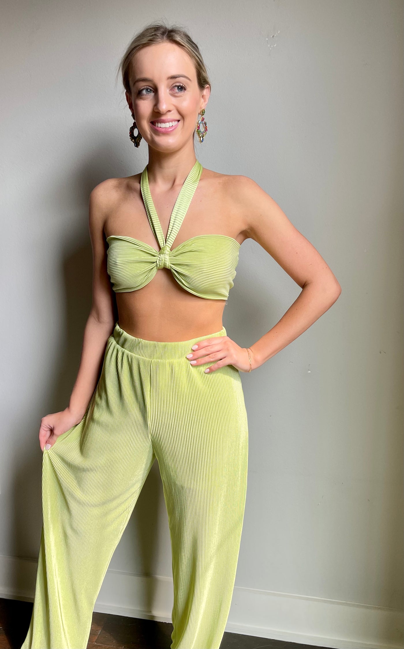 This halter neck two-piece pleated set is perfect for the beach.