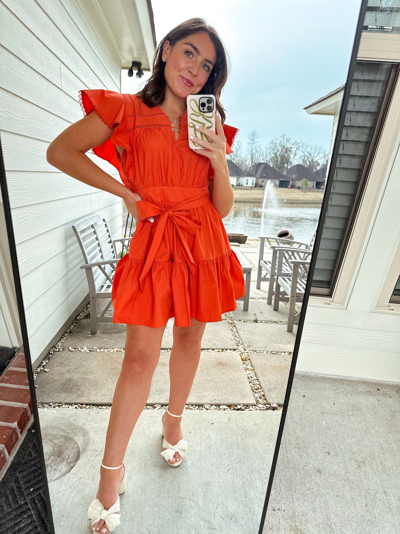 orange eyelet dress Bailey Wrap Give Her Six Style it with wedges or simple sandals perfect for weekend events Marley Coral Eyelet Midi Dress