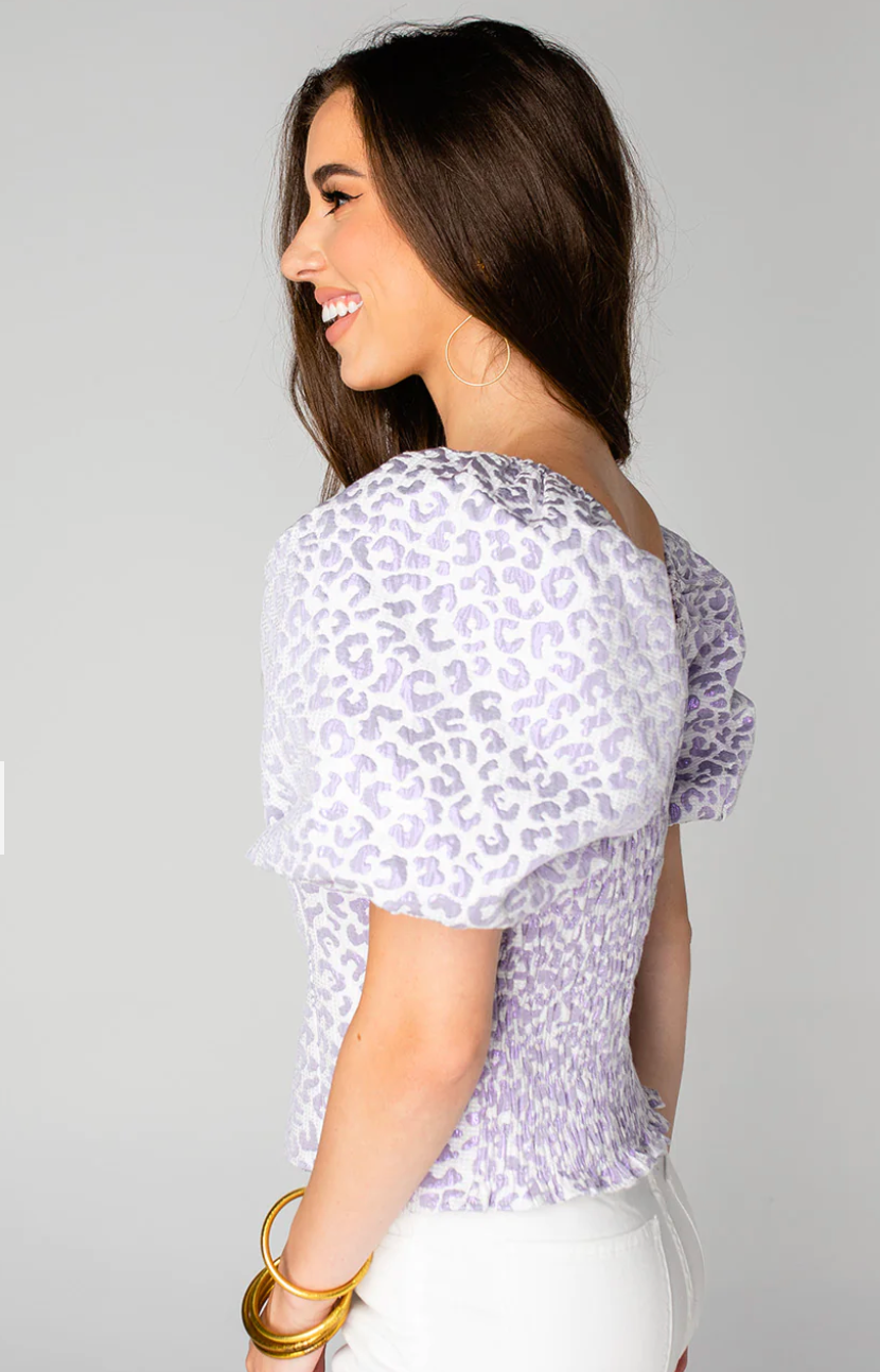 This purple animal print top by BuddyLove features puff sleeves.