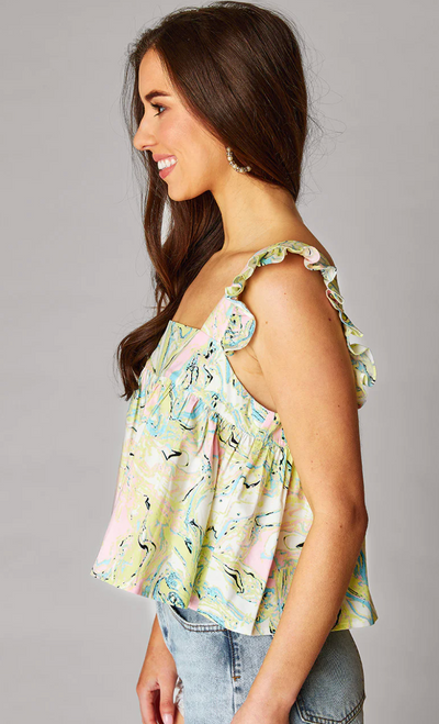 This ruffle swing tank top is slightly cropped in the front. 