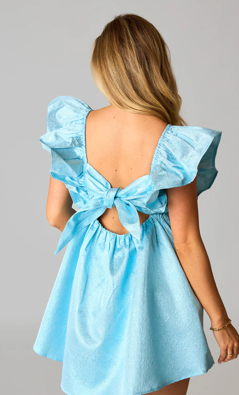 This BuddyLove blue ruffle mini dress with pockets features a bow tie in the back.