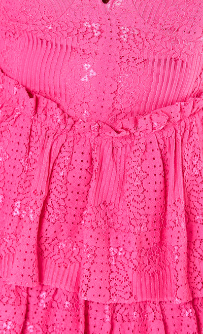 We love this hot pink lace mini dress's shimmery lace detailing.