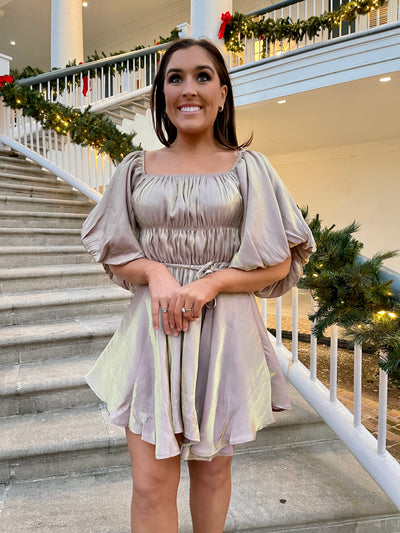 This gold metallic puff sleeve dress from Shop Silvs is perfect for holiday parties and sorority events.