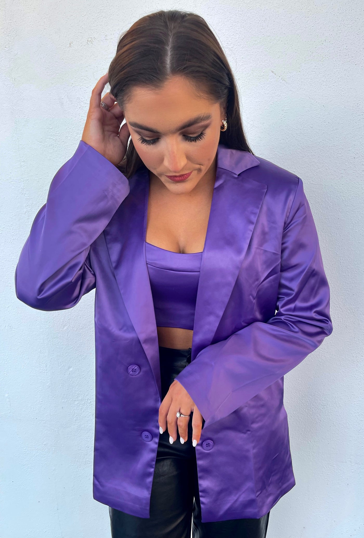 The Lila Blazer Set from Shop Silvs is a purple crop top with matching blazer that will add some glam to your wardrobe.
