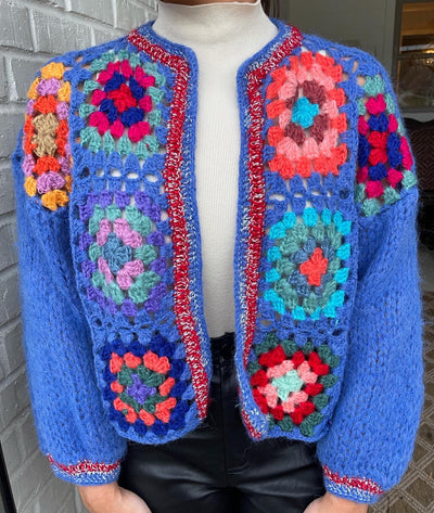 This Crochet Chic Cardigan from Shop Silvs is a chunky crochet cardigan that looks great thrown over a basic tee and paired with jeans or leggings.