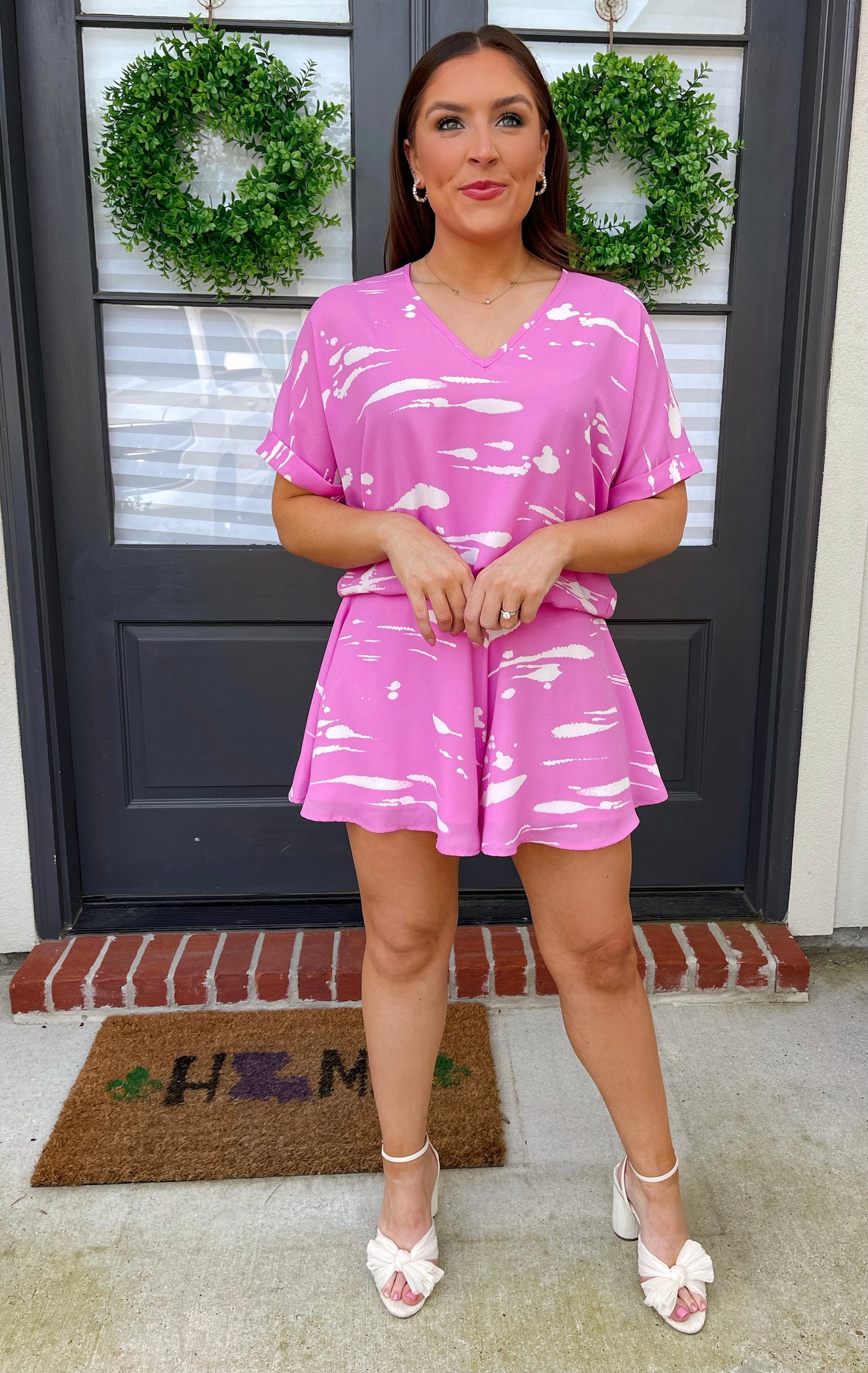 The Madi Top from Shop Silvs is a pink and white loungewear top that makes it easy to look great while keeping it casual.