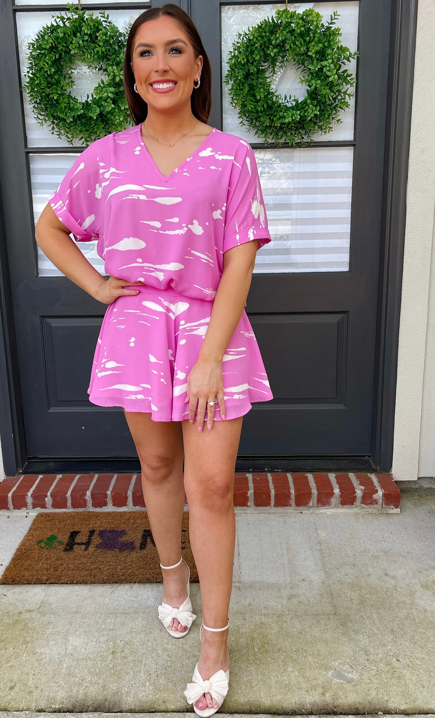 Dress up this pink and white loungewear top by pairing with your favorite pair of strappy sandals.