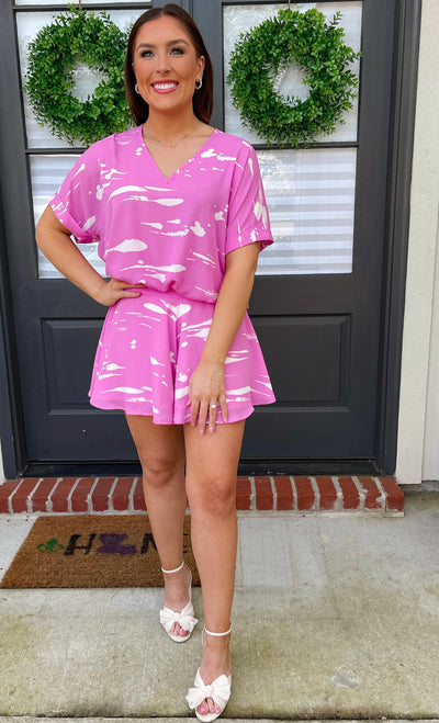 Dress up this pink and white loungewear top by pairing with your favorite pair of strappy sandals.